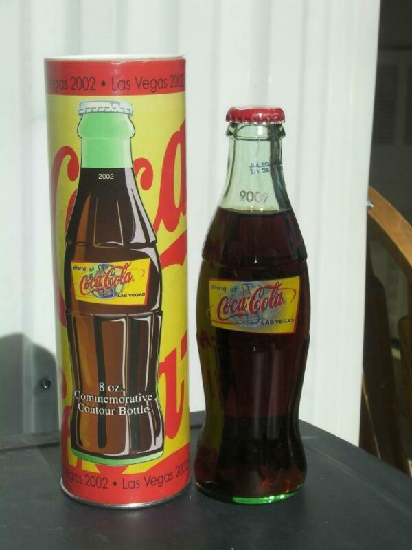 2002 WORLD OF COCA COLA LAS VEGAS COMMEMORATIVE BOTTLE IN TUBE