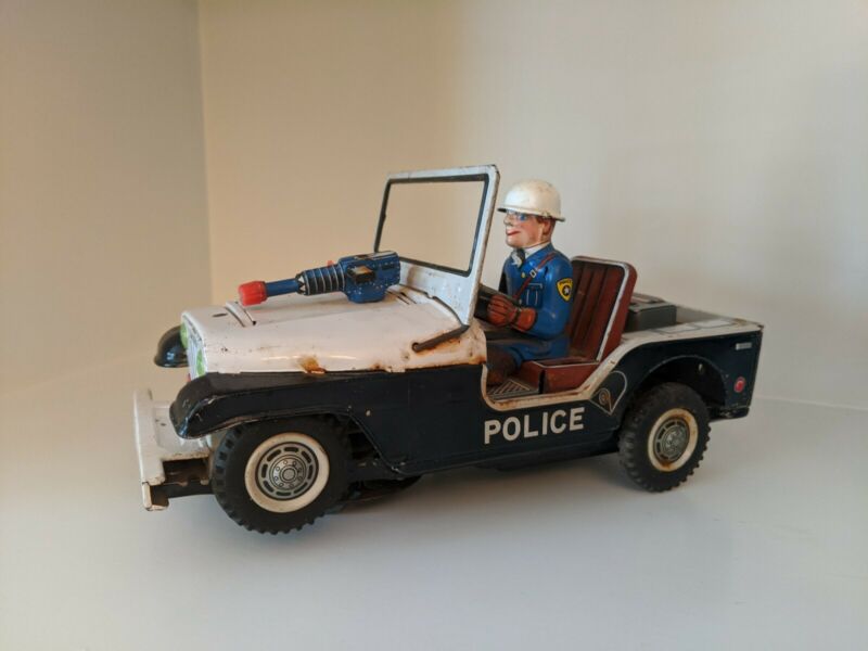 Vintage Nomura Tn Japan Tin Battery Op Turn O Matic Police Jeep Car Gun